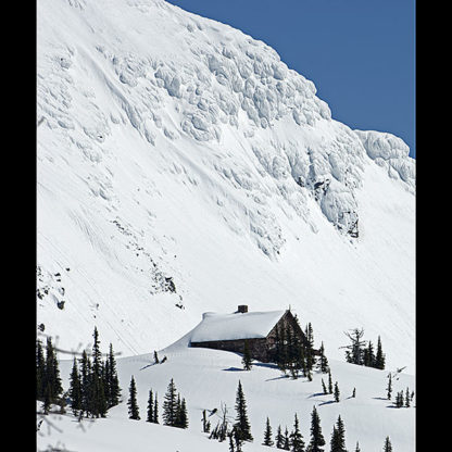 A late winter setting of Granite Park Chalet, Glacier National Park